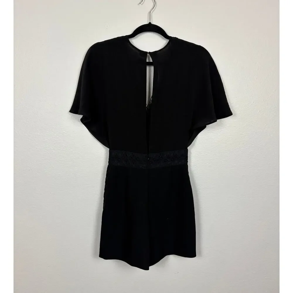 Maje Idelle Lace Trim Flutter Sleeve V Neck Silk Romper in Noir XS